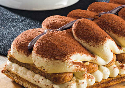 A long and beautiful tiramisu cake