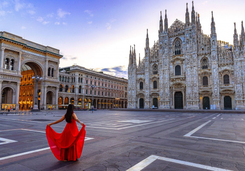 milan cathedral and a lady with a red dress