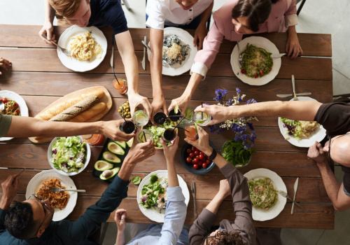 top view of people at the table with food