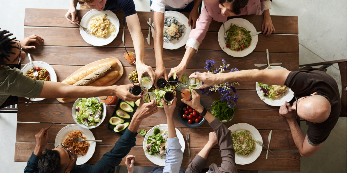 top view of people at the table with food