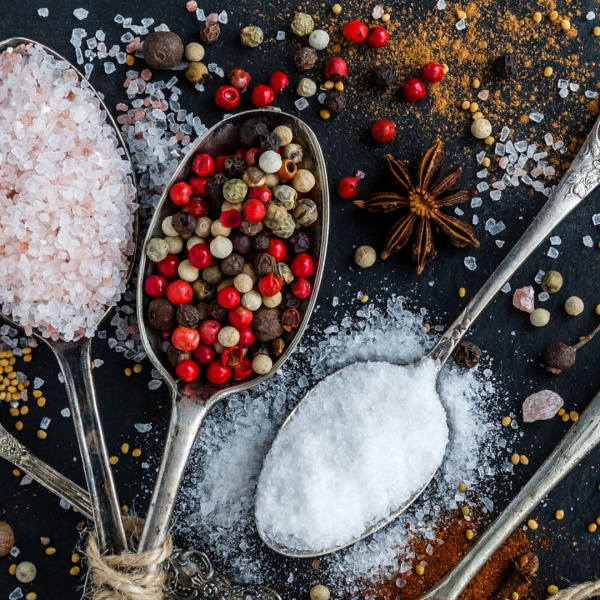 salt pepper spieces and a spoon