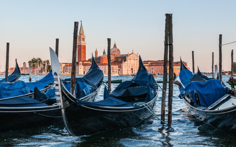 floating gondolas in venetian canal